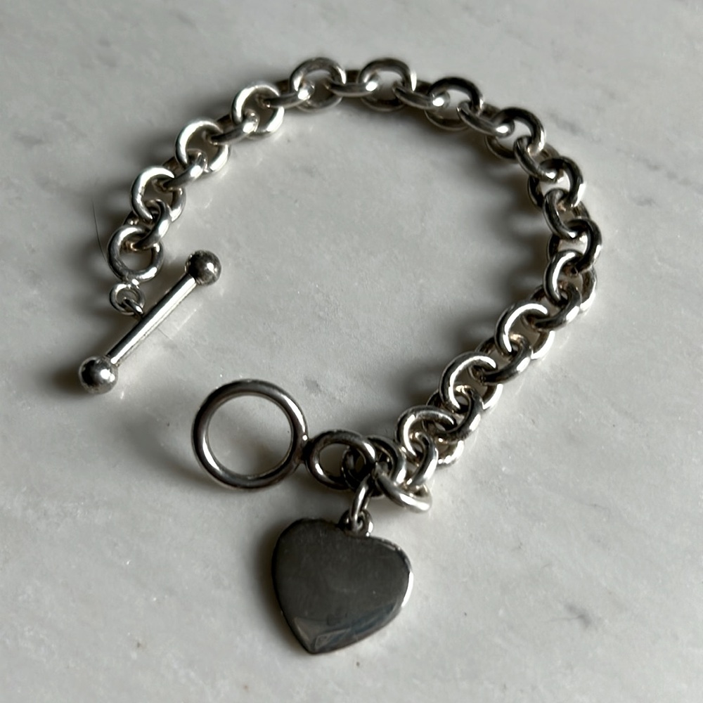 Sterling silver charm bracelet with engravable heart